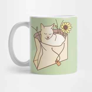 Cat in a paper gift bag Mug